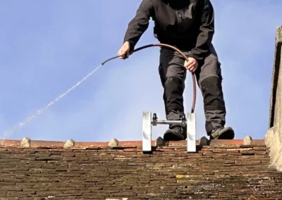 Démoussage traitement toiture